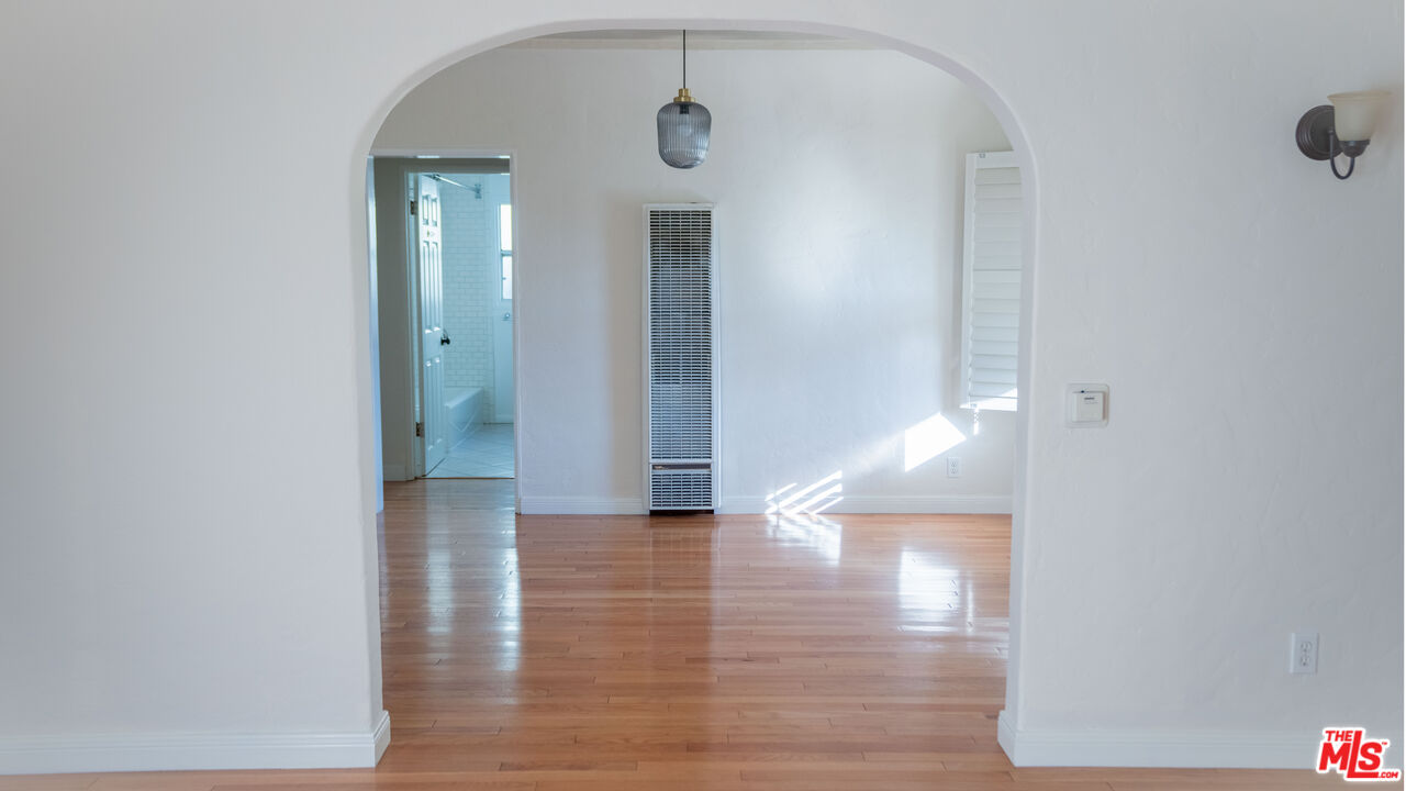 3411 Larga Avenue Los Angeles, CA 90039 - Photo 16 of 26 a view of a hallway with wooden floor