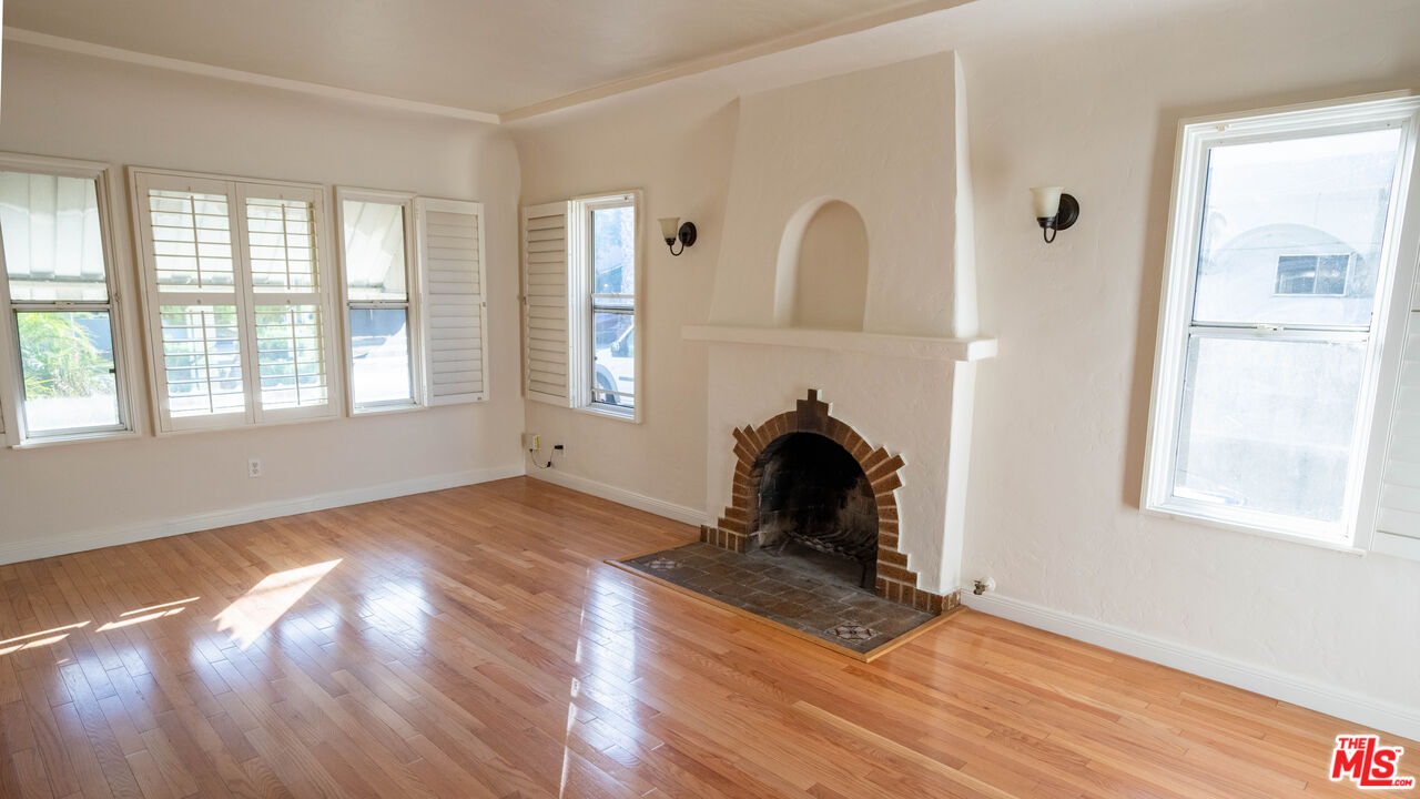 3411 Larga Avenue Los Angeles, CA 90039 - Photo 3 of 26 a view of empty room with windows and fireplace