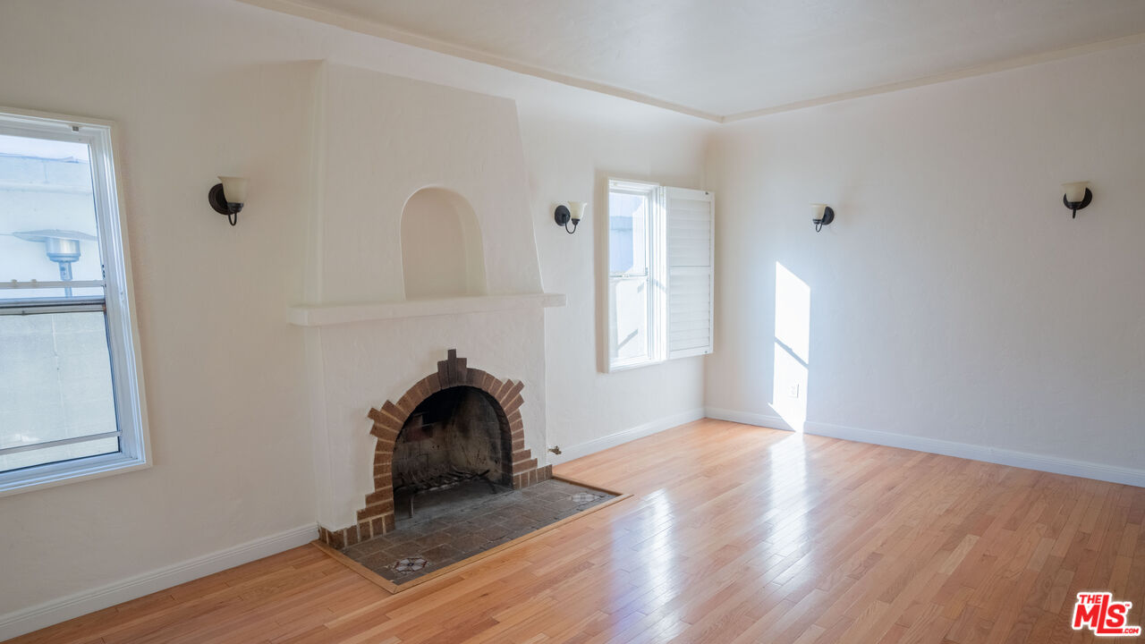 3411 Larga Avenue Los Angeles, CA 90039 - Photo 5 of 26 a view of a livingroom with wooden floor and a window