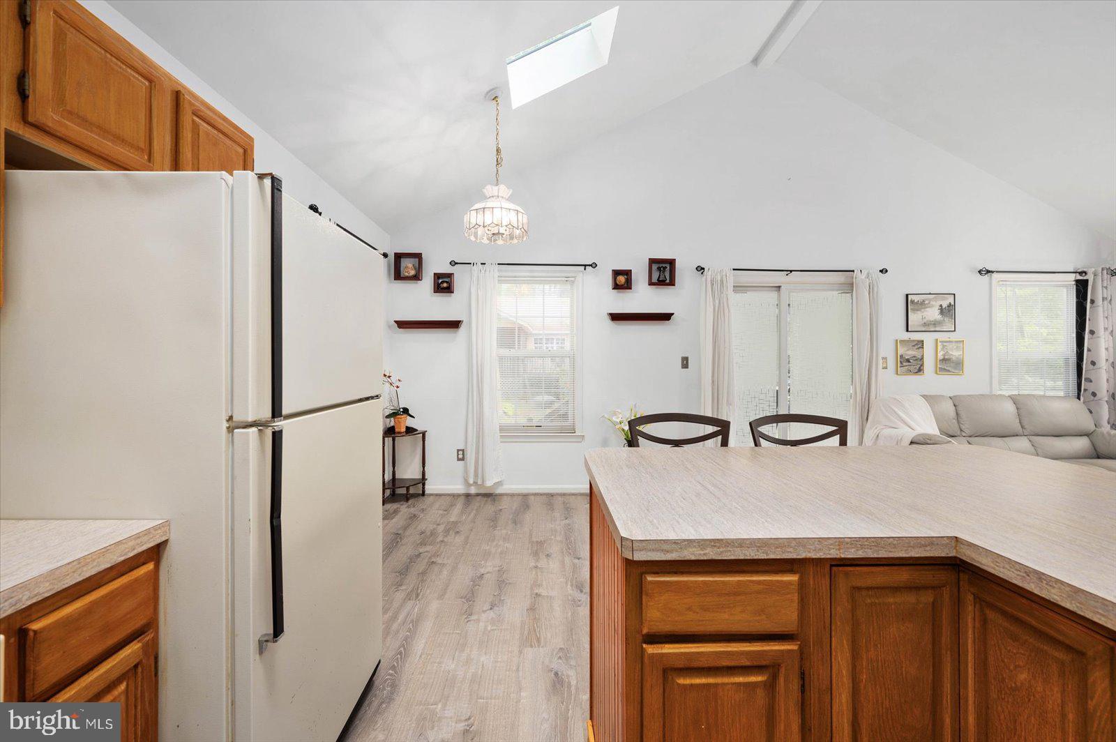 156 Sandyhook Road Berlin, MD 21811 - Photo 14 of 95 a view of a kitchen with a sink and refrigerator