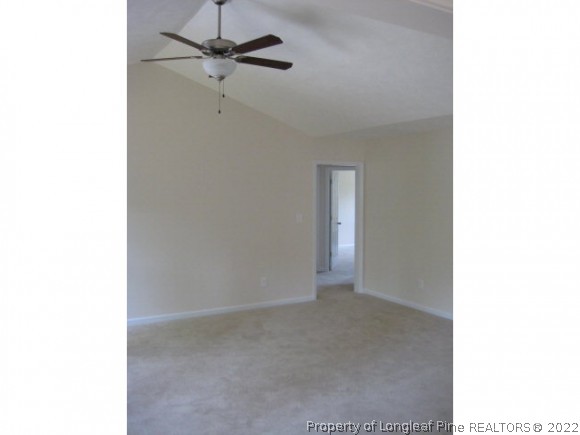 22 Rockingham Street Spring Lake, NC 28390 - Photo 16 of 20 a view of an empty room with a ceiling fan