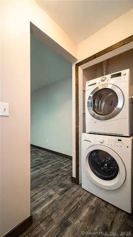 a utility room with washing machine