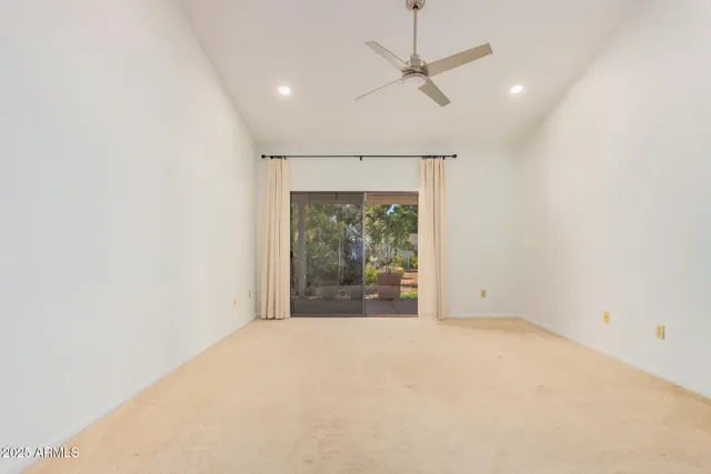 an empty room with a fireplace