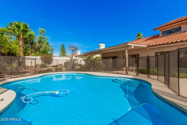 a view of outdoor space with swimming pool and porch