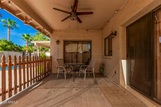a view of a porch with furniture