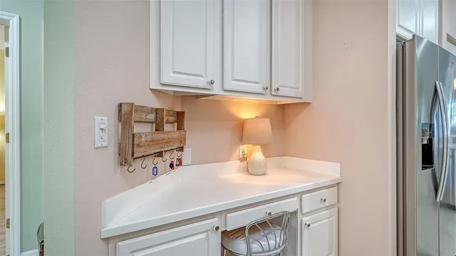 a bedroom with a bed and a mirror