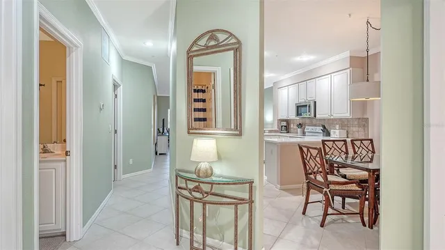 a living room with furniture and a lamp