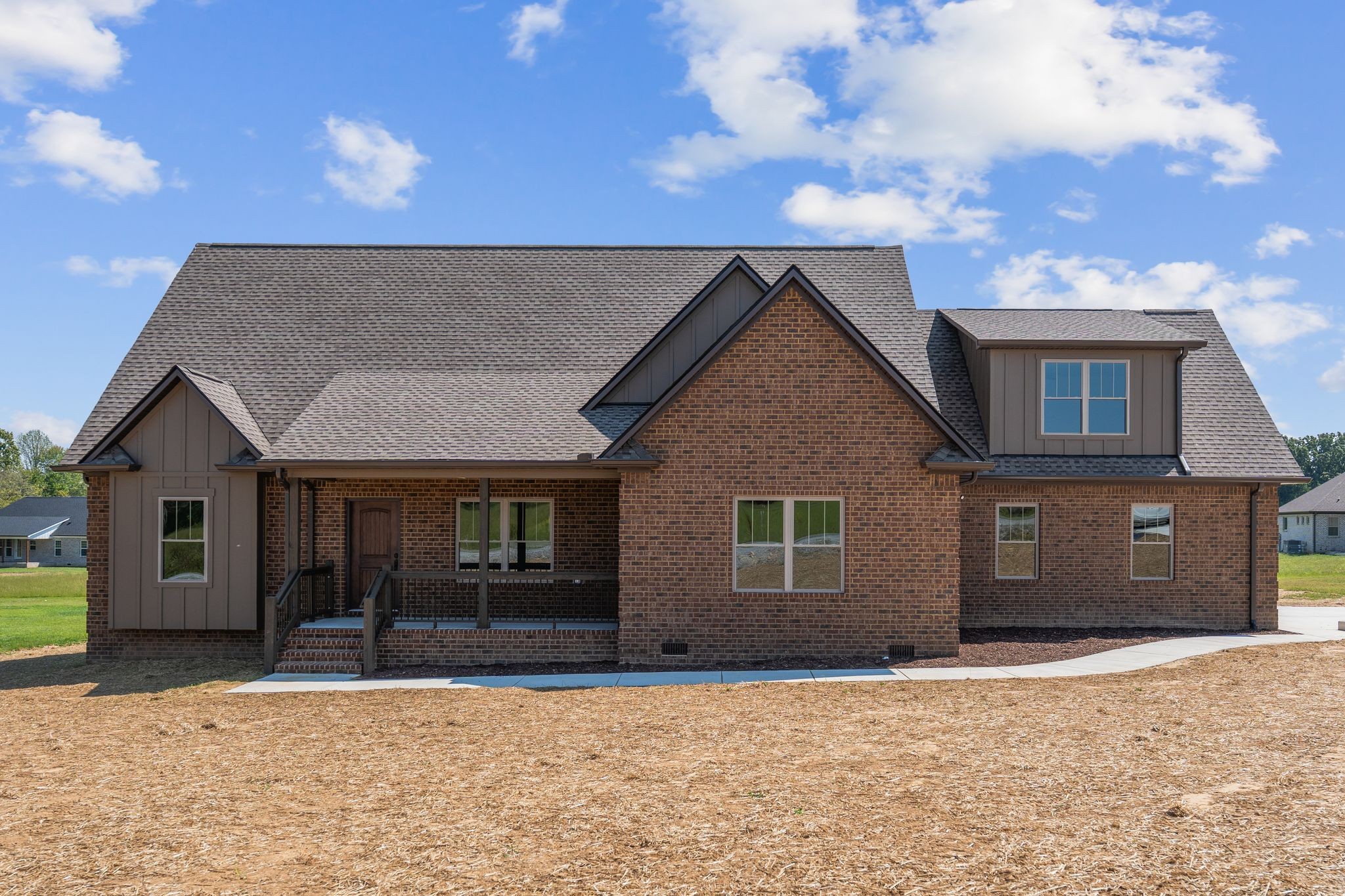 a front view of a house with a garage