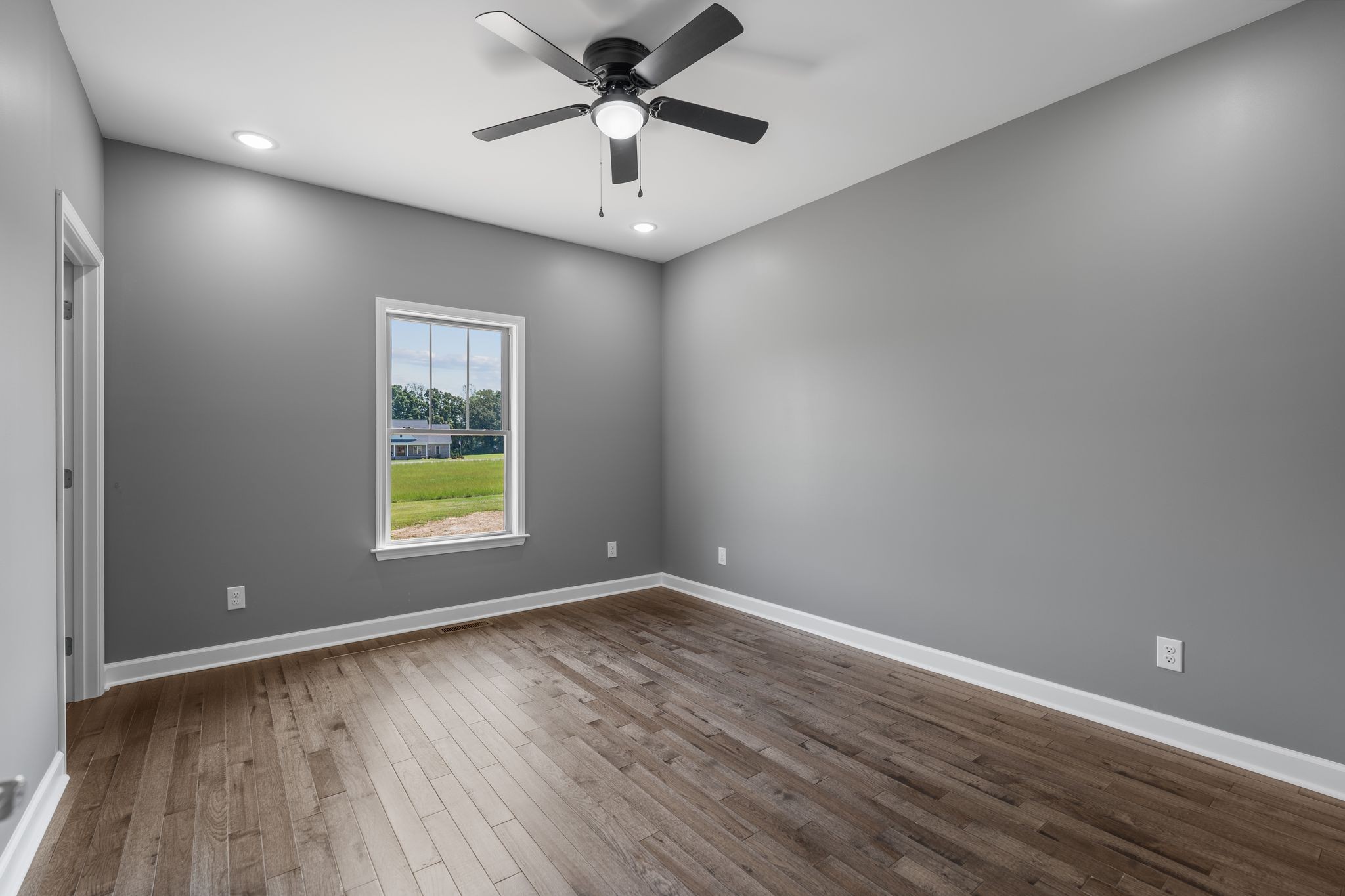 83 Watson Court Leoma, TN 38468 - Photo 13 of 18 an empty room with a window and a fan