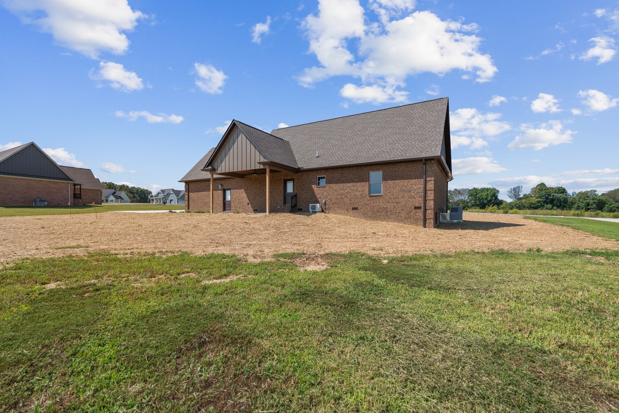 83 Watson Court Leoma, TN 38468 - Photo 17 of 18 a front view of a house with garden