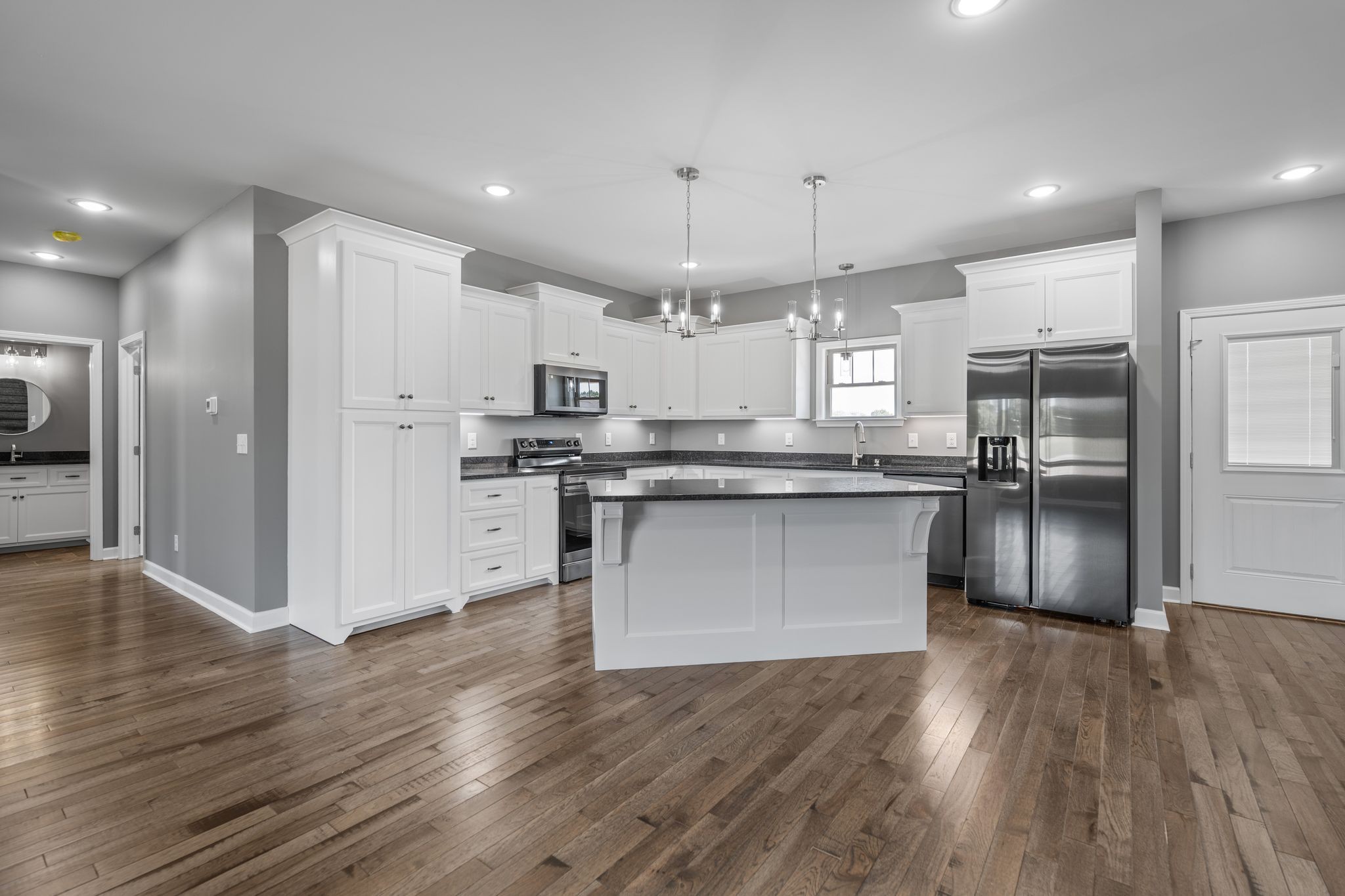 83 Watson Court Leoma, TN 38468 - Photo 5 of 18 a kitchen with stainless steel appliances granite countertop a refrigerator and a stove