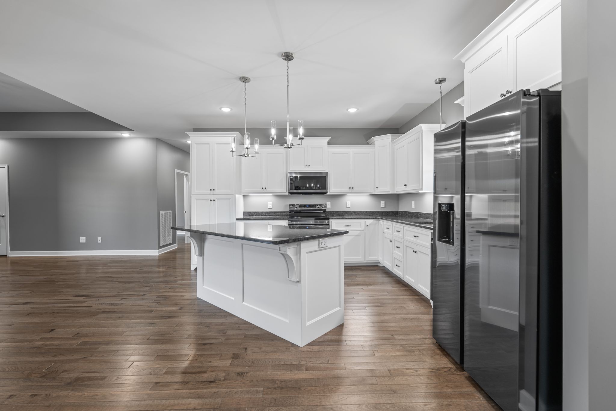 83 Watson Court Leoma, TN 38468 - Photo 6 of 18 a kitchen with kitchen island a counter top space a refrigerator and a sink