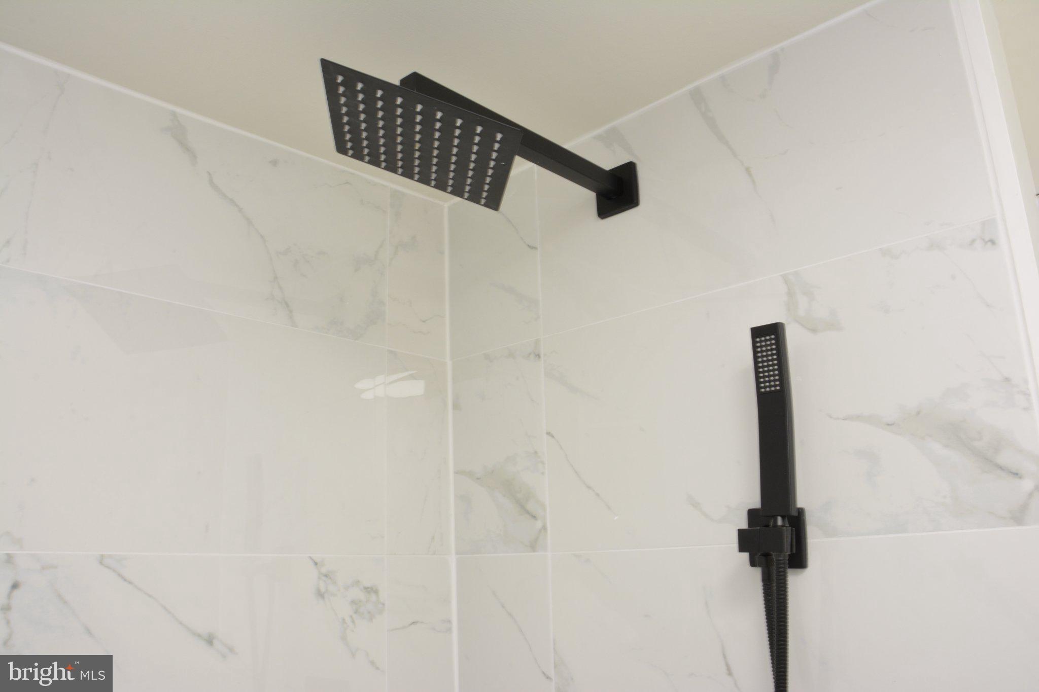 1006 Circle Drive Keymar, MD 21757 - Photo 33 of 45 Sleek black shower fixtures shine bright.