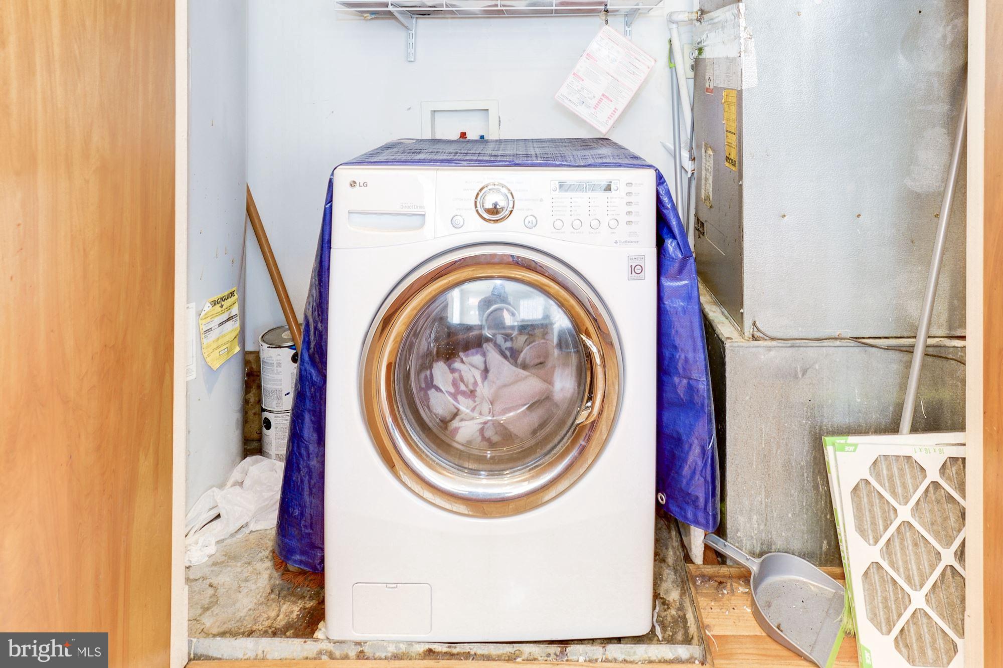 2363 Champlain Street Northwest, Unit 8 Washington, DC 20009 - Photo 13 of 30 a utility room with dryer and washer