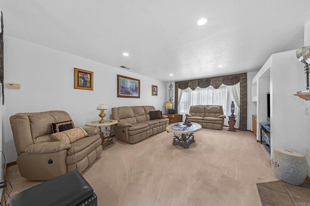 30265 Miller Road Valley Center, CA 92082 - Photo 13 of 56 a living room with furniture and a couch
