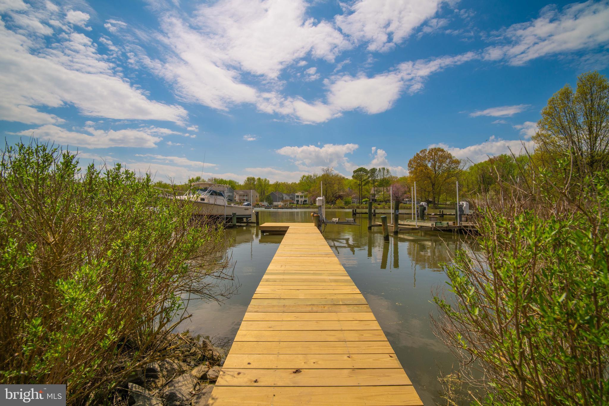 5930 Sneed Drive Deale, MD 20751 - Photo 1 of 38 a view of a lake from a balcony
