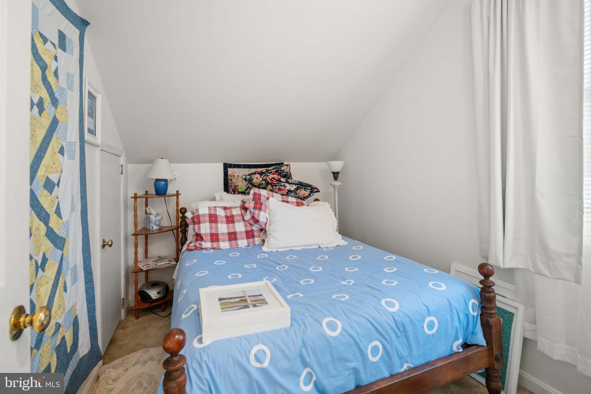 5930 Sneed Drive Deale, MD 20751 - Photo 32 of 38 a bedroom with a bed and furniture