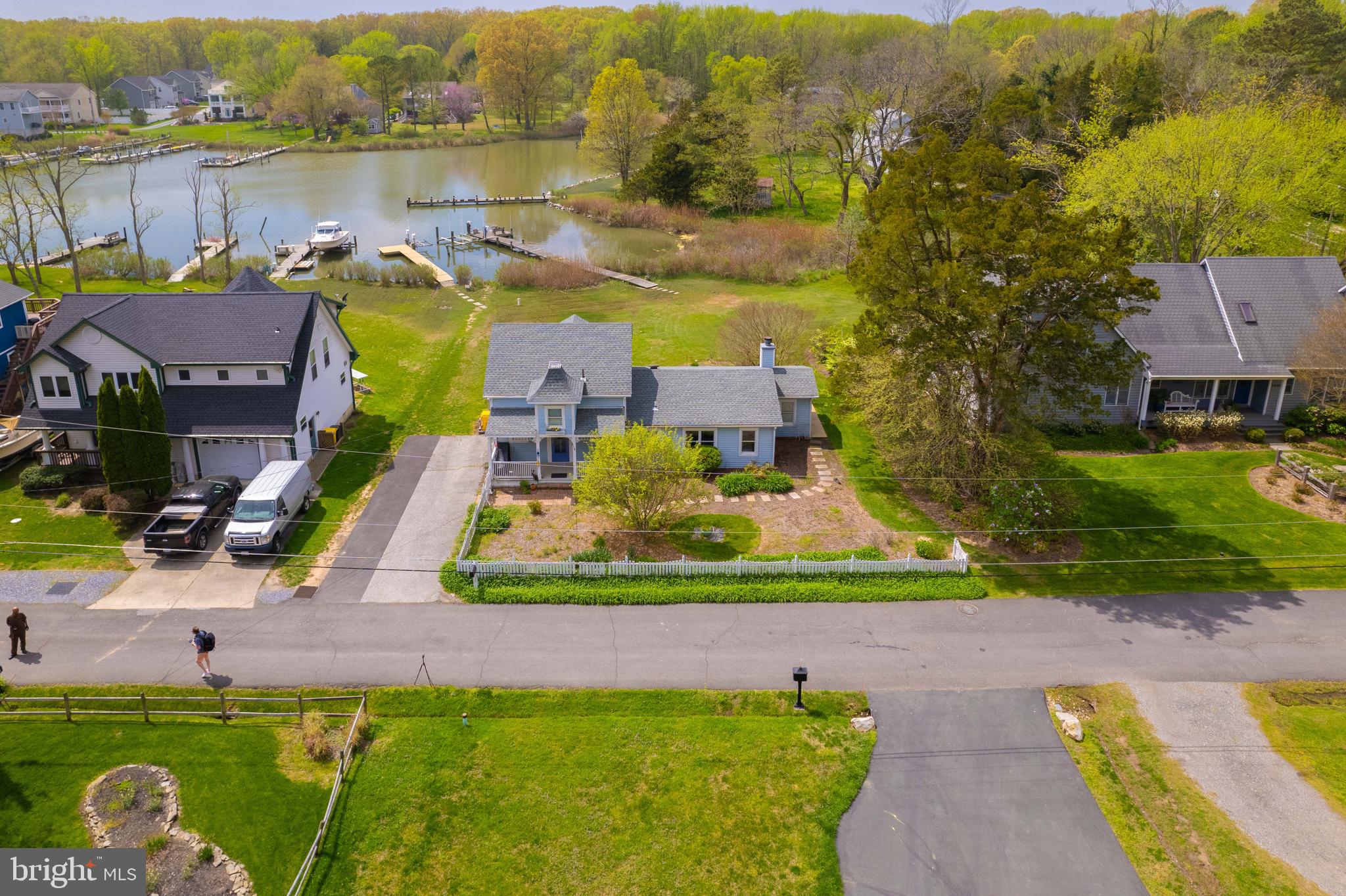 5930 Sneed Drive Deale, MD 20751 - Photo 7 of 38 an aerial view of a house with a yard and lake view