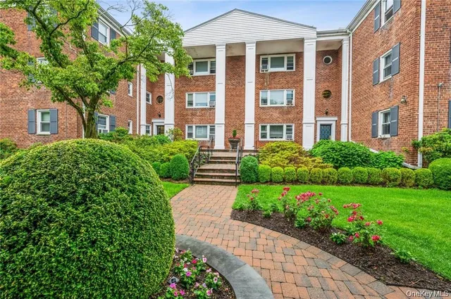 a house view with a garden space