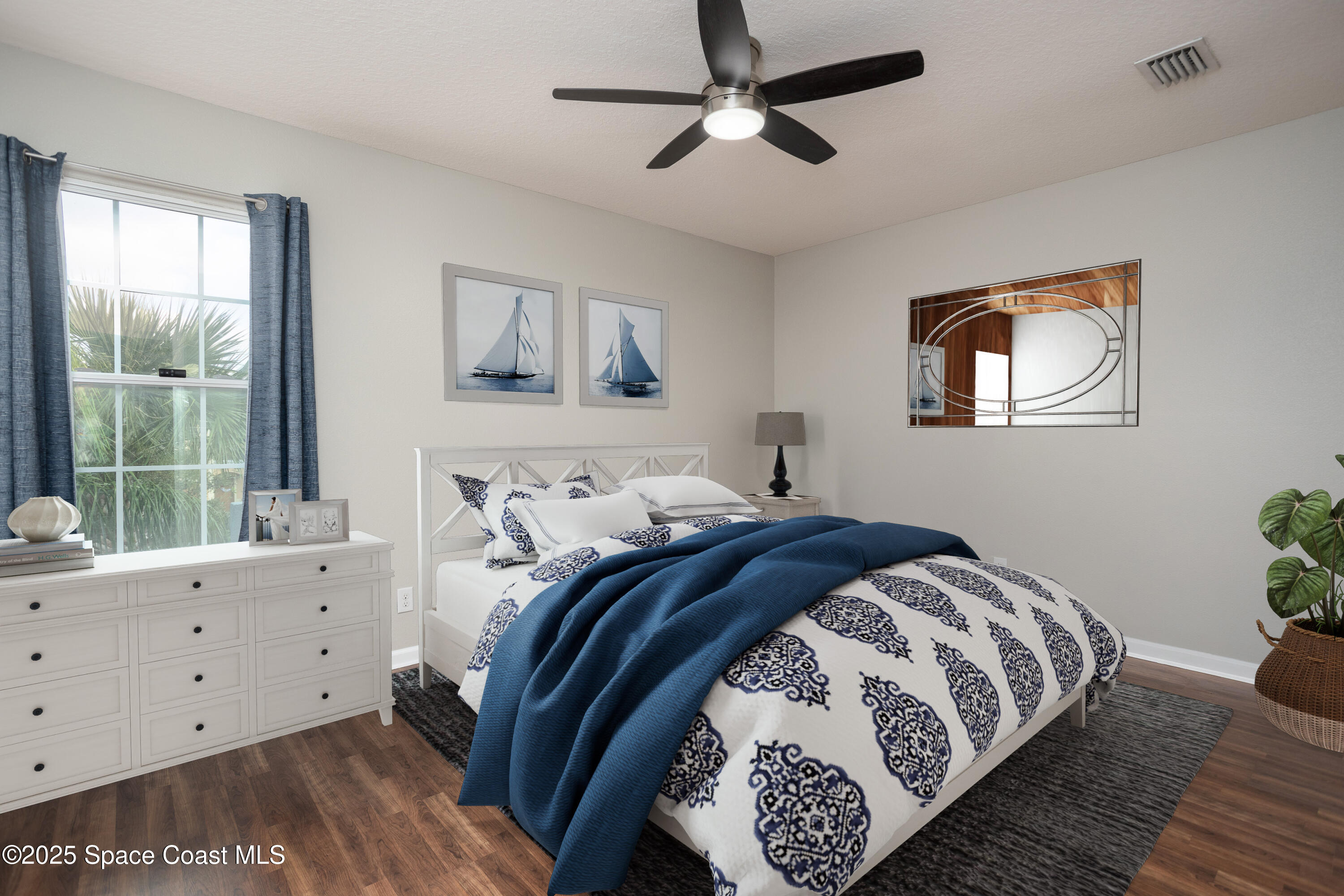 2780 Reston Street, Unit 104 Melbourne, FL 32935 - Photo 15 of 29 a bedroom with a large bed and a window