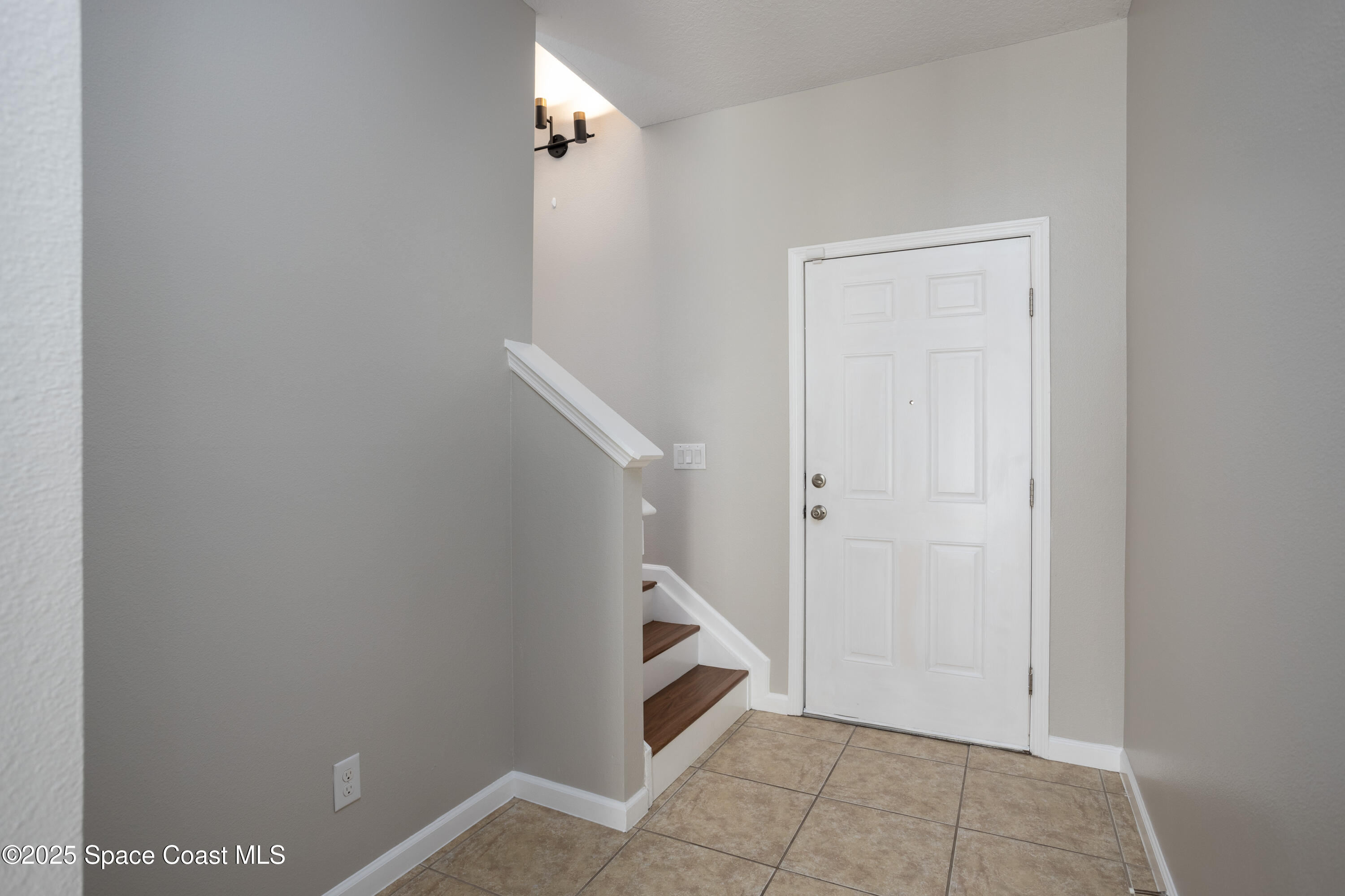 2780 Reston Street, Unit 104 Melbourne, FL 32935 - Photo 3 of 29 a view of an entryway