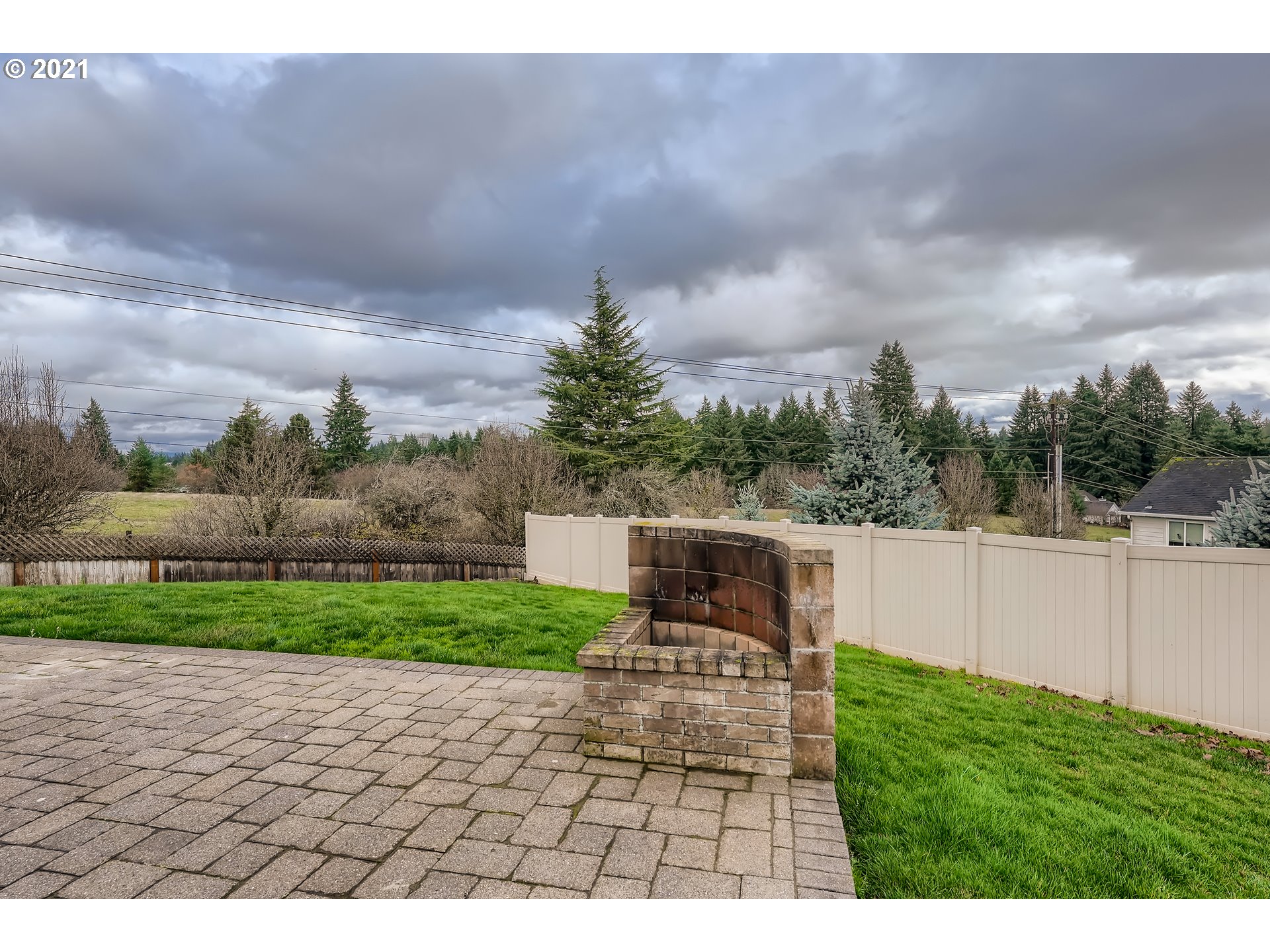 2417 North 9th Circle Ridgefield, WA 98642 - Photo 31 of 32 a view of a backyard with sitting area