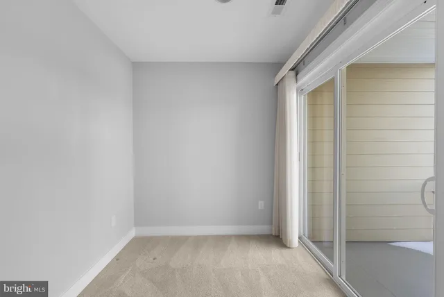 a view of a room with racks on the wall