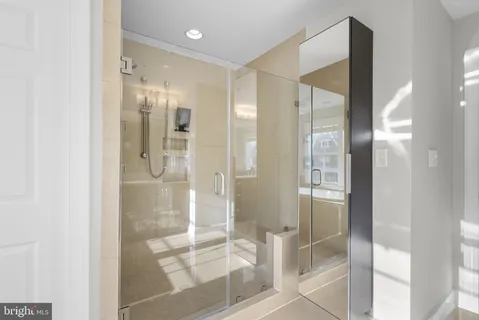 a view of a bathtub and a sink