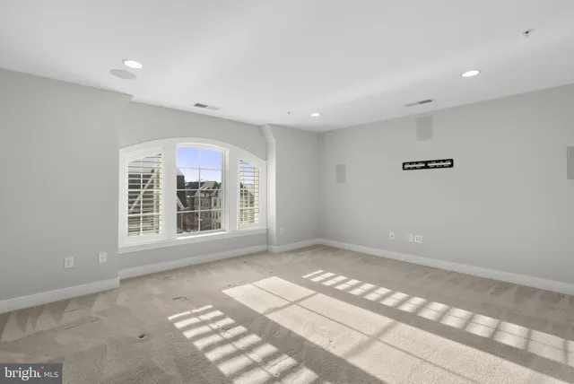 a view of empty room with a window