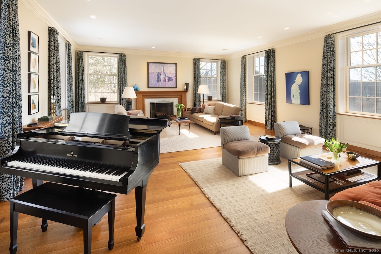 11 Valley Road Salisbury, CT 06039 - Photo 6 of 40 a living room with furniture fireplace and a large window