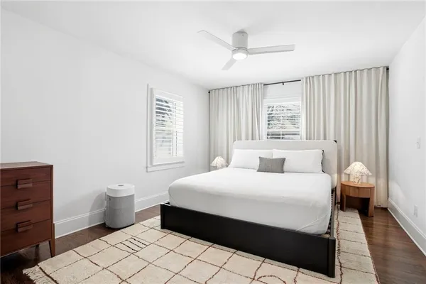 a bedroom with a bed and a closet