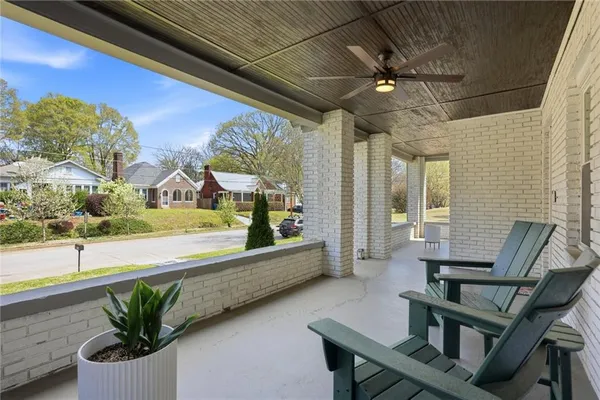 a view of a patio with swimming pool