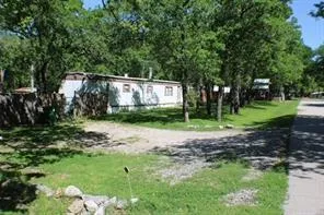 a view of a backyard with a garden