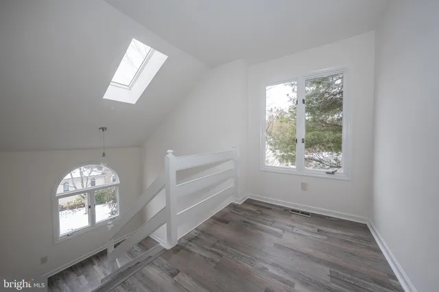 a view of a hallway with entryway