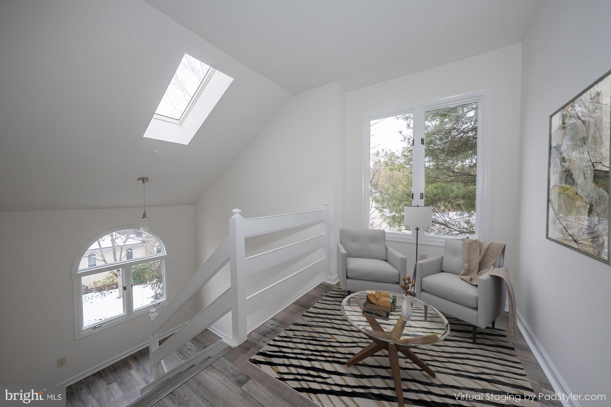 514 Waters Edge Newtown Square, PA 19073 - Photo 15 of 29 a living room with furniture and a chandelier