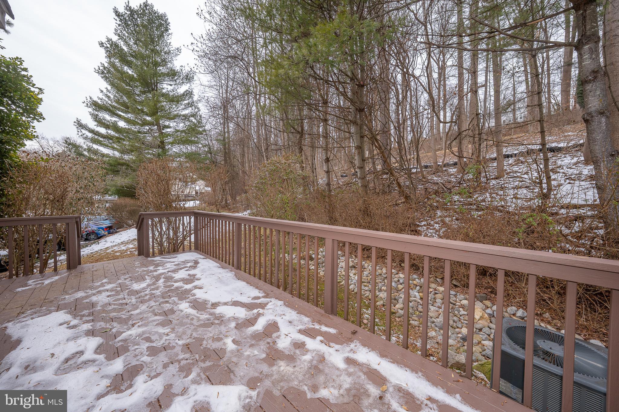 514 Waters Edge Newtown Square, PA 19073 - Photo 28 of 29 a balcony with wooden floor and fence