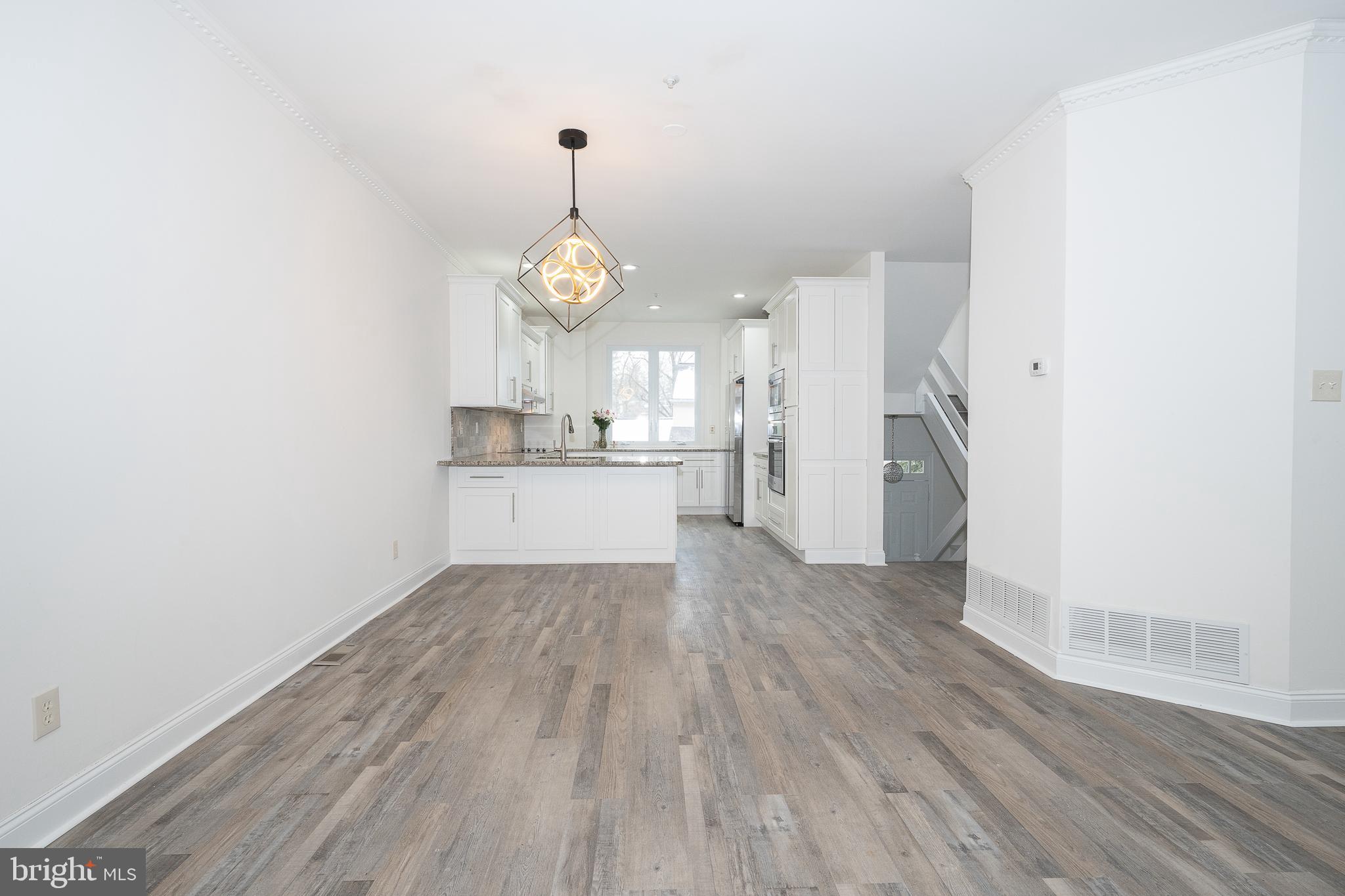 514 Waters Edge Newtown Square, PA 19073 - Photo 9 of 29 a view of empty room with wooden floor and window