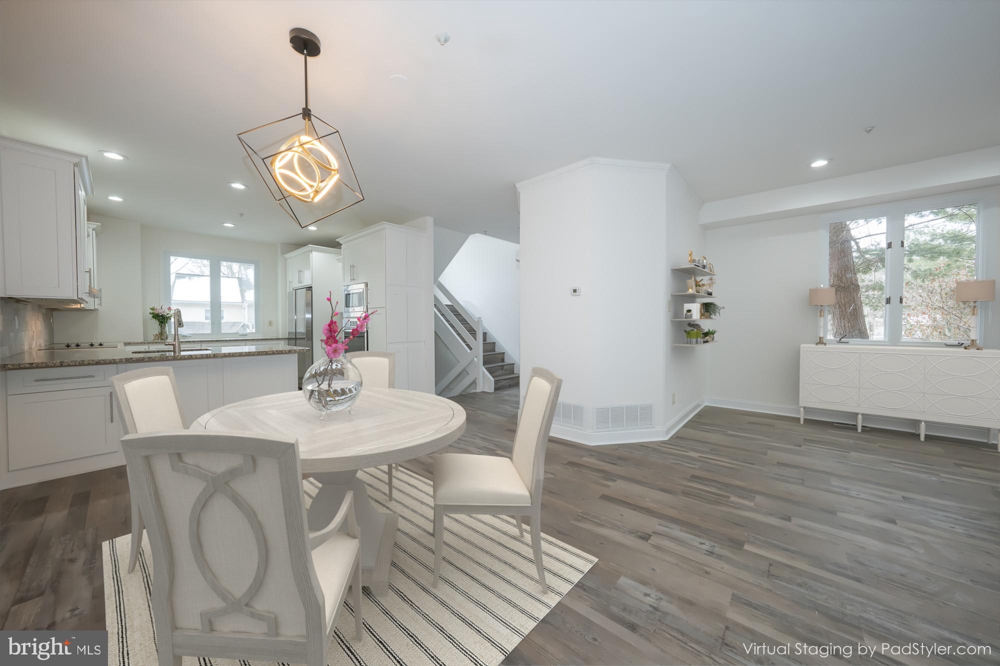 514 Waters Edge Newtown Square, PA 19073 - Photo 10 of 29 a view of a dining room with furniture and wooden floor