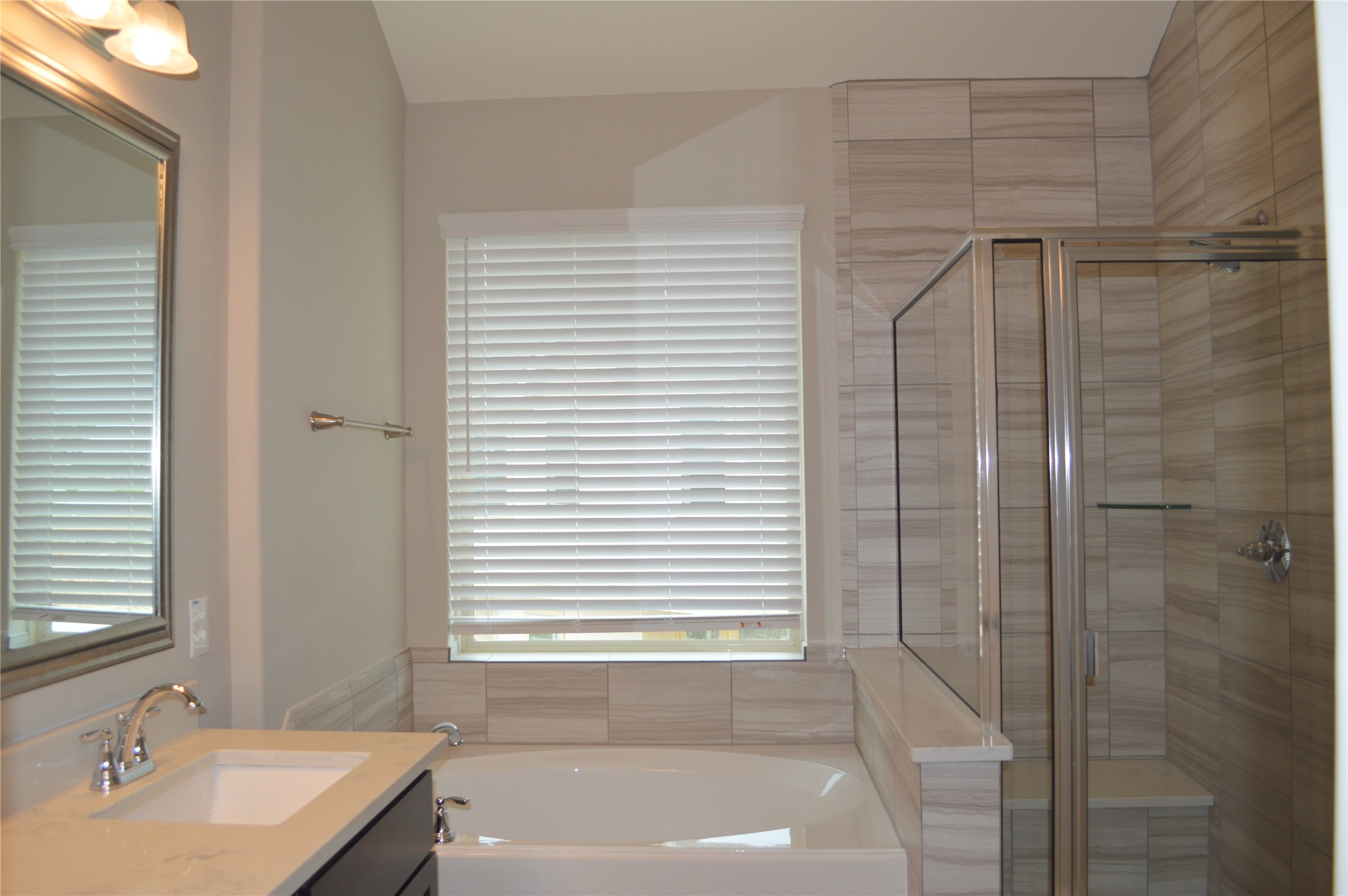 28043 Rocky Heights Drive Spring, TX 77386 - Photo 15 of 16 a bathroom with a bathtub and shower