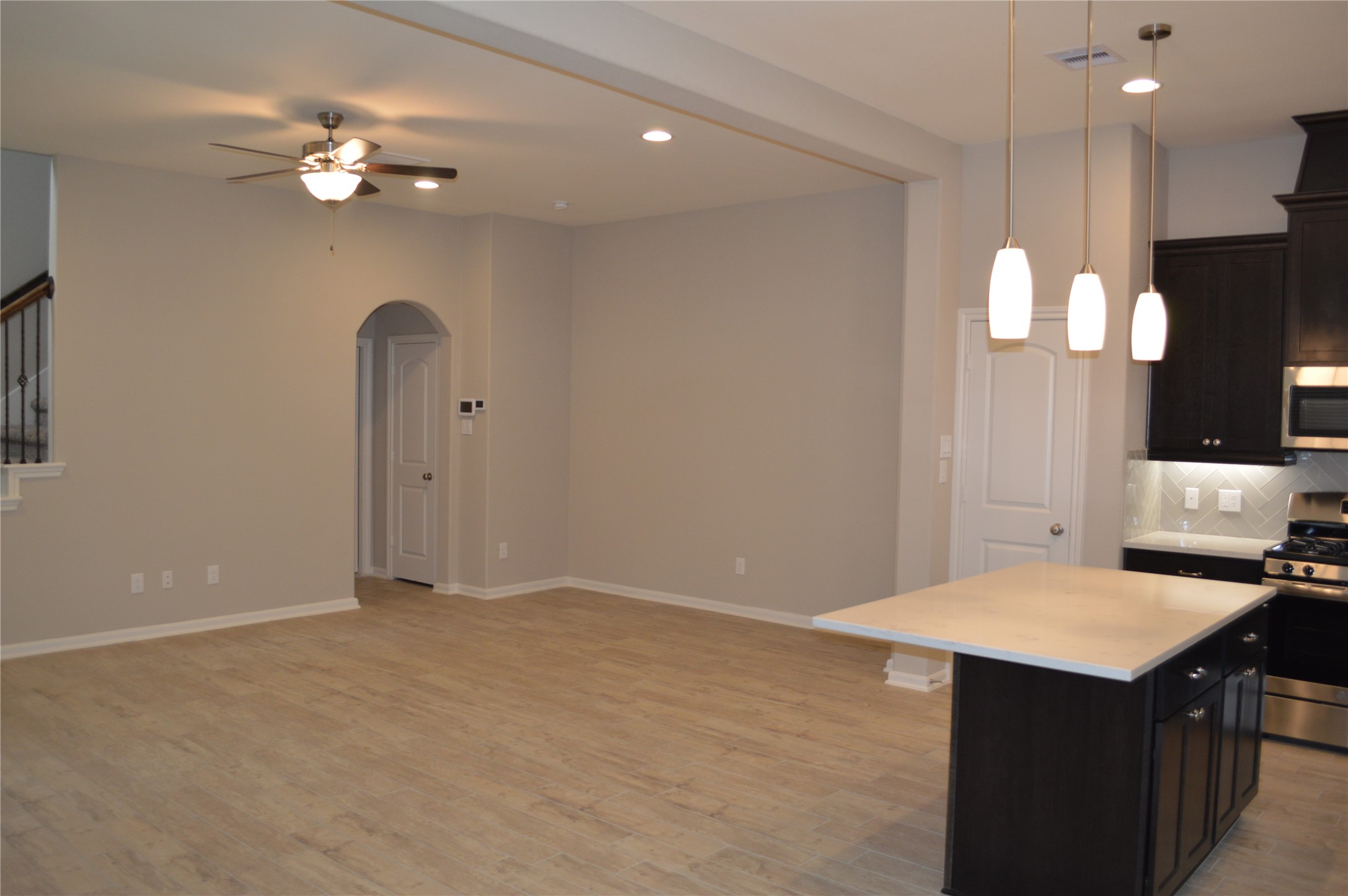 28043 Rocky Heights Drive Spring, TX 77386 - Photo 5 of 16 a kitchen with a sink chandelier and a stove