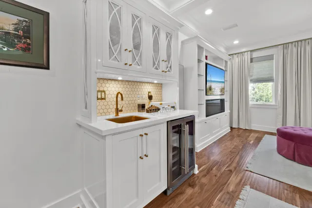 a kitchen with stainless steel appliances a white stove top oven and a refrigerator