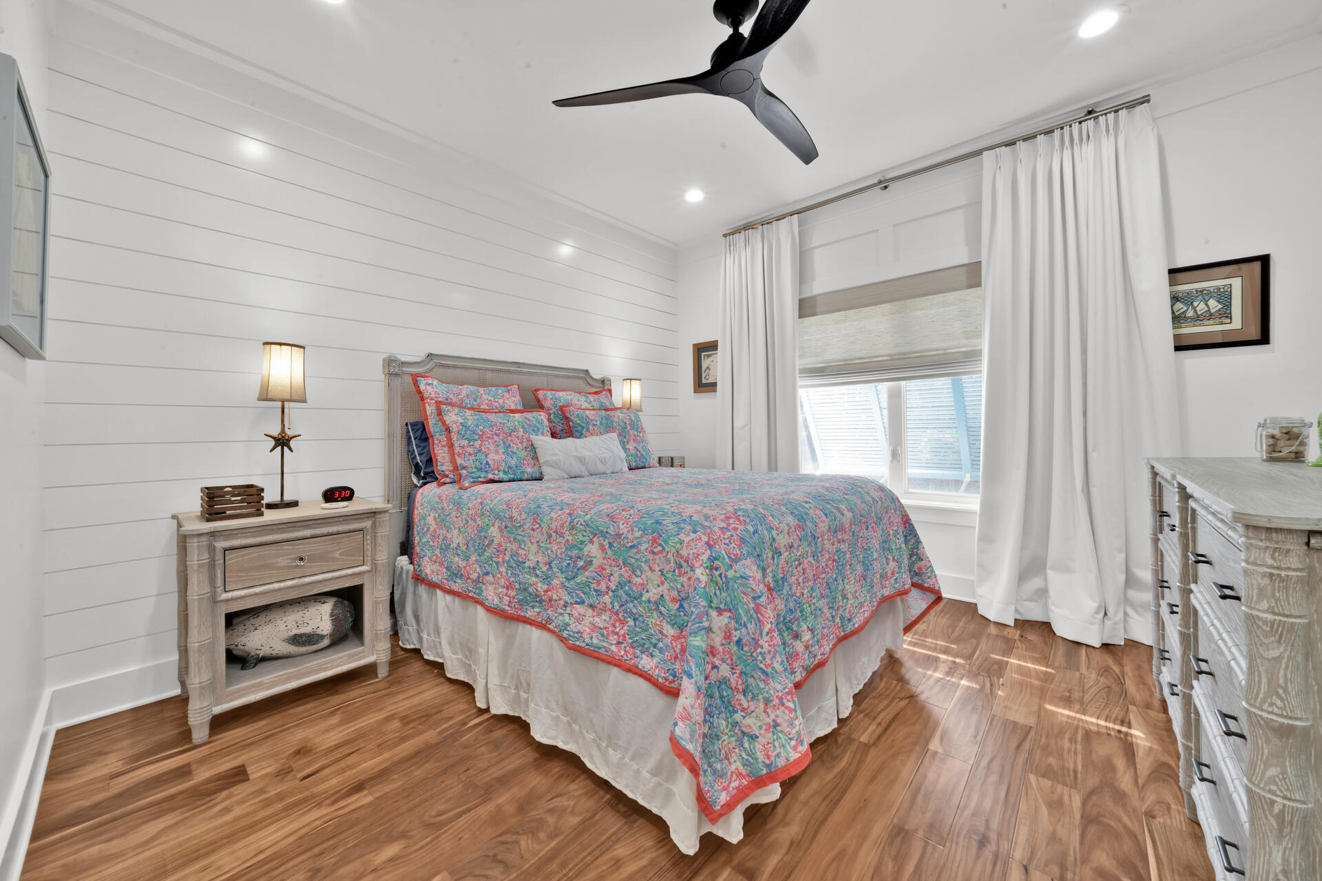 290 Seabreeze Boulevard Inlet Beach, FL 32461 - Photo 29 of 43 a bedroom with a bed and a flat tv screen