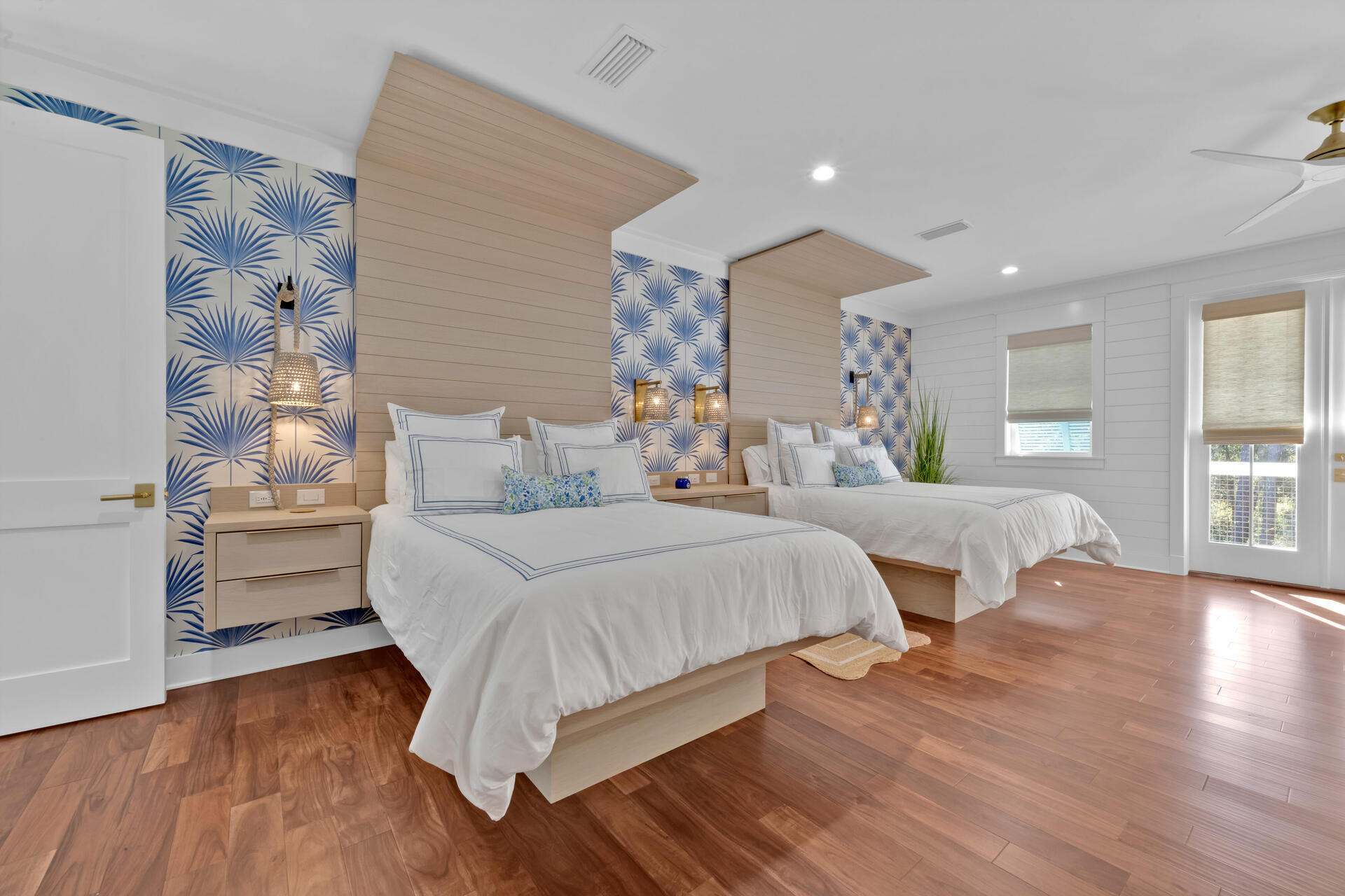 290 Seabreeze Boulevard Inlet Beach, FL 32461 - Photo 31 of 43 a spacious bedroom with two beds and a large window