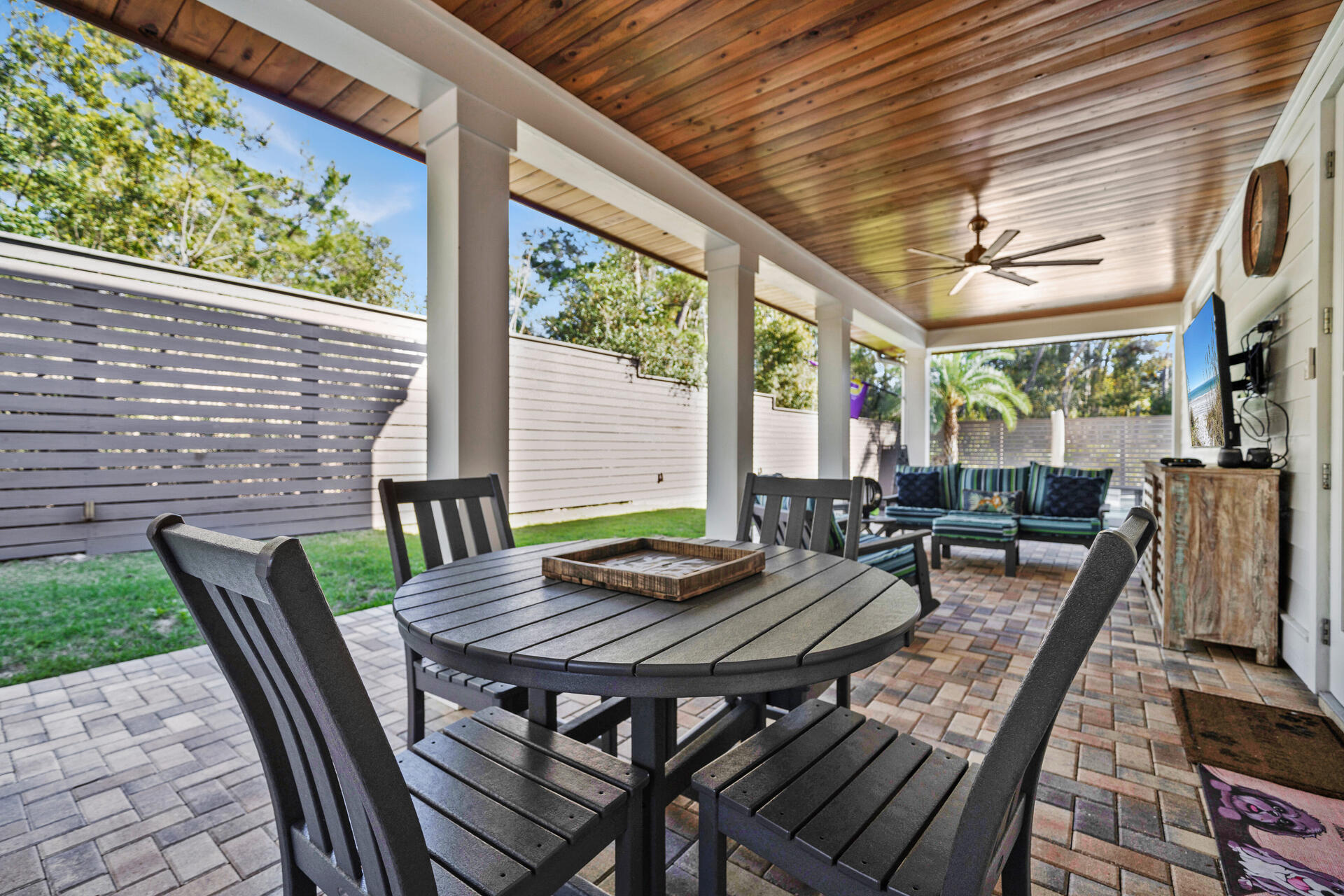 290 Seabreeze Boulevard Inlet Beach, FL 32461 - Photo 37 of 43 a view of backyard with seating space and wooden floor