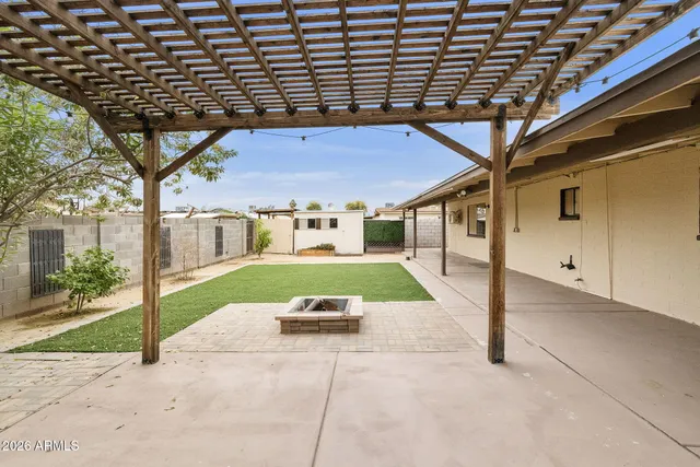 a view of yard with car parked
