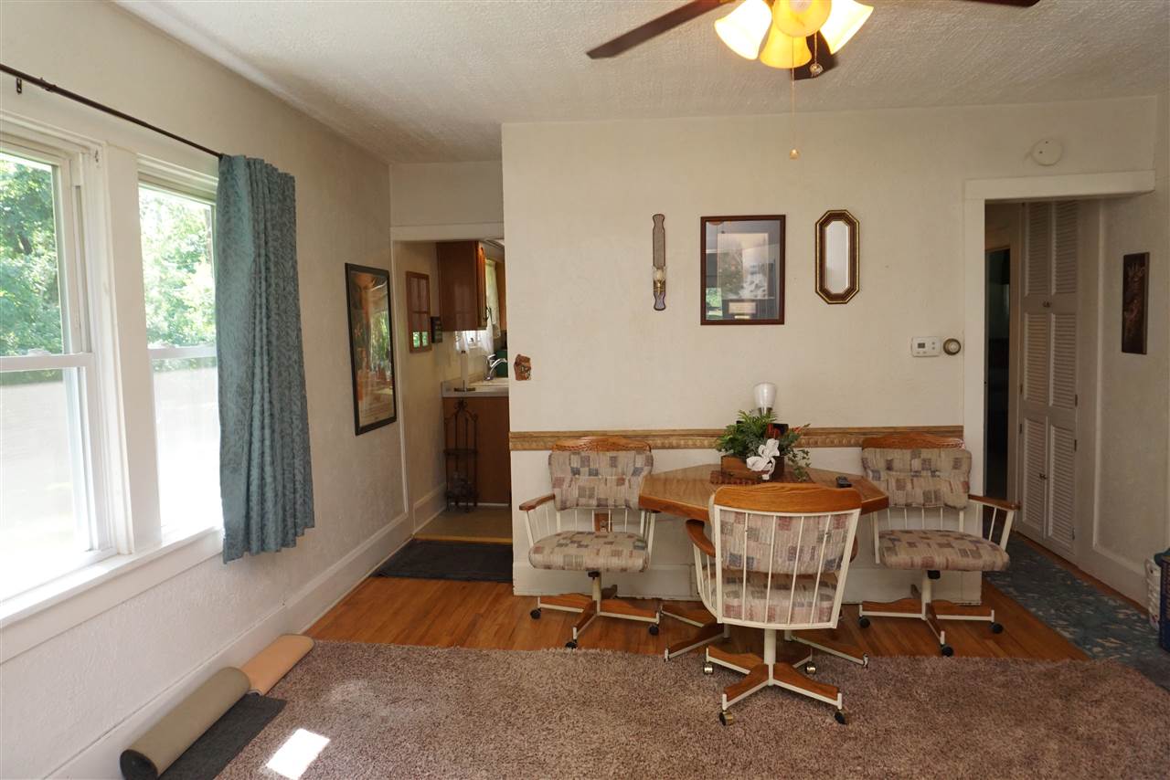 4486 Safford Road Rockford, IL 61101 - Photo 15 of 19 a dining room with furniture and window