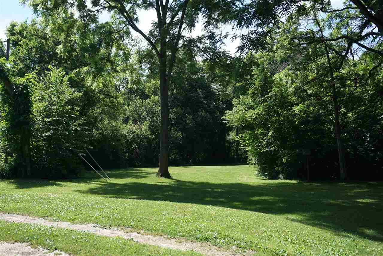 4486 Safford Road Rockford, IL 61101 - Photo 2 of 19 a view of a park with a tree