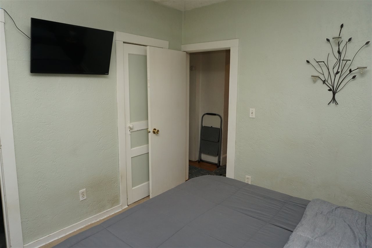 4486 Safford Road Rockford, IL 61101 - Photo 6 of 19 a view of a livingroom with a flat screen tv