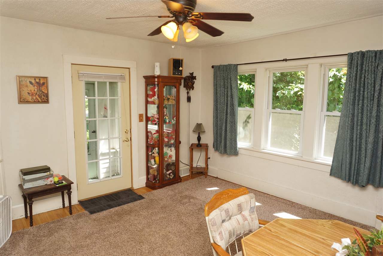 4486 Safford Road Rockford, IL 61101 - Photo 8 of 19 a bedroom with a bed and a window