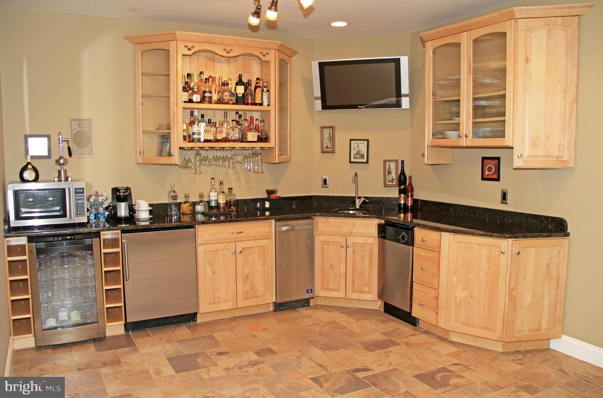 8345 Roxborough Loop Gainesville, VA 20155 - Photo 21 of 30 Custom Granite Wet Bar